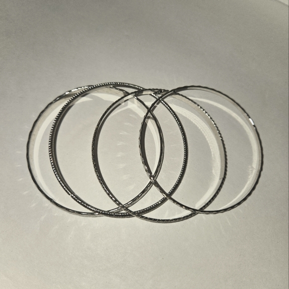 unknown Jewelry - Silvertone Stackable Bracelet Bundle 4pcs